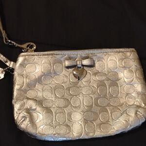 Coach Metallic Silver Wristlet with Bow and Heart Charm